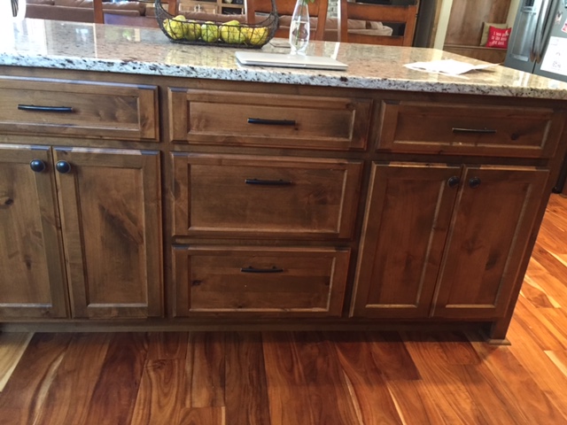 https://valleycustomcabinets.com/wp-content/uploads/2016/02/Custom-Rustic-Knotty-Alder-Island-cabinet-Stillwater-MN.jpg