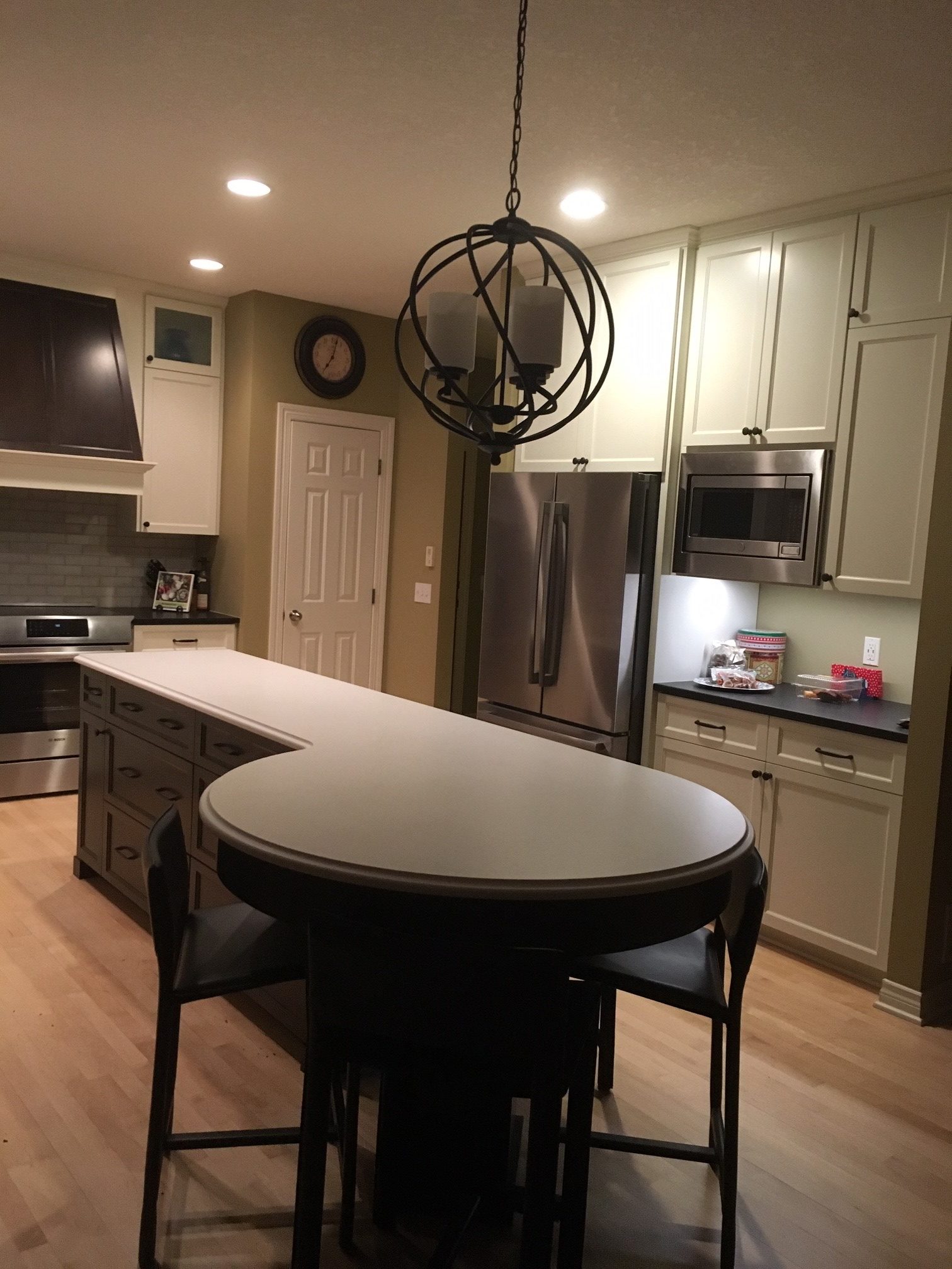 https://valleycustomcabinets.com/wp-content/uploads/2019/01/Custom-Cabinets-Kitchen-Remodel-Lake-Elmo-MN-Painted-Cabinets-Stained-Island-Table-seating-e1547850254832.jpg